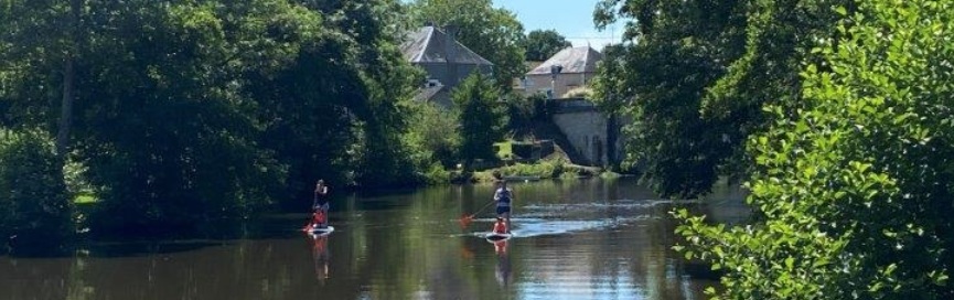 Paddle boarding on the river